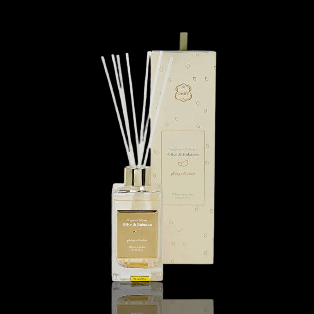 LALINE Olive & Babassu Reed Diffuser 180 ml glass bottle with white reeds beside its cream gift box