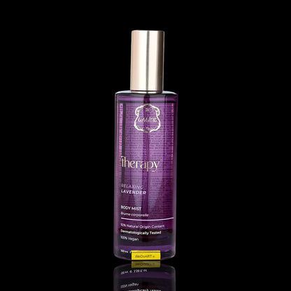 Bottle of Therapy Relaxing Lavender Body Mist with a purple liquid and silver cap on a black background