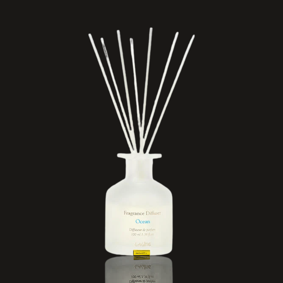 Laline Ocean reed diffuser 100 ml in a frosted white glass bottle with a bundle of white reeds