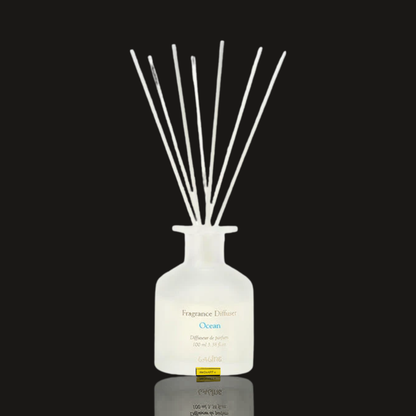 Laline Ocean reed diffuser 100 ml in a frosted white glass bottle with a bundle of white reeds