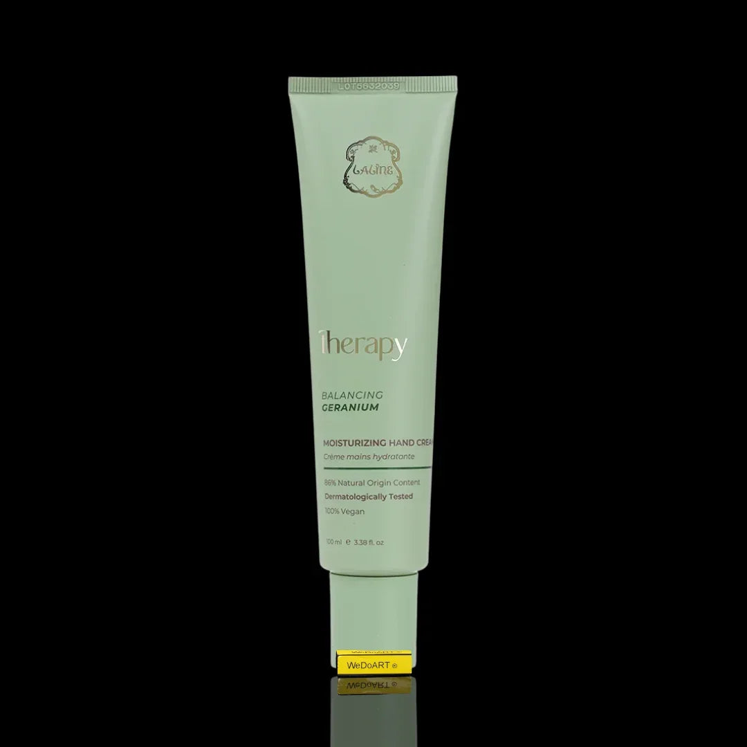 Therapy Balancing Geranium Moisturizing Hand Cream tube against a black background.
