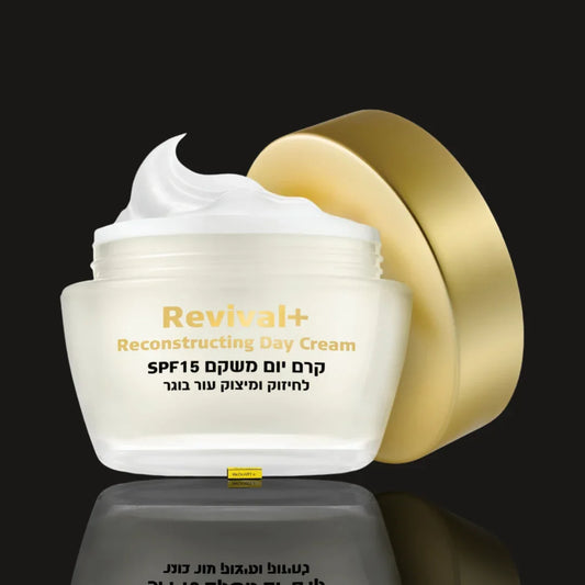 Open jar of Careline Revival+ Reconstructing Day Cream SPF15 with a swirl of white cream and a gold lid