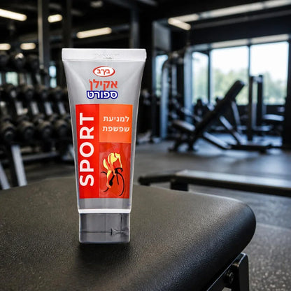 Akilan Sport cream tube resting on a gym bench in a fitness center