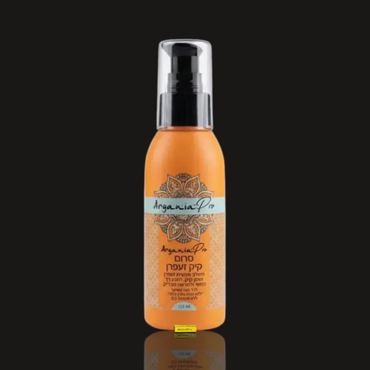 Argania Pro Castor Saffron Hair Serum 125 ml orange pump bottle with clear cap on a dark background