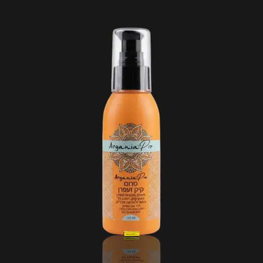 Argania Pro Castor Saffron Hair Serum 125 ml orange pump bottle with clear cap on a dark background