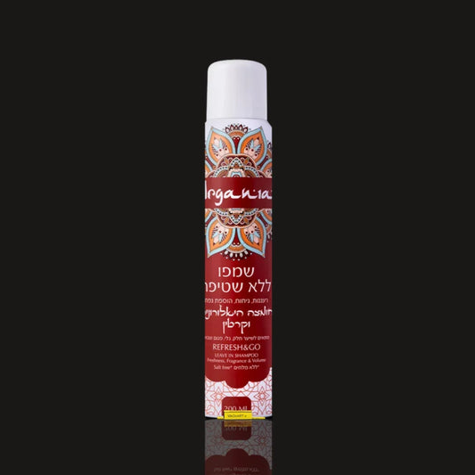ARGANIA no-rinse dry shampoo 200 ml white aerosol can with red mandala label on a dark background