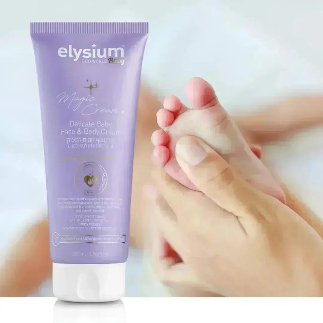Purple Elysium-Baby face and body cream tube beside a parent's hand holding a baby's foot