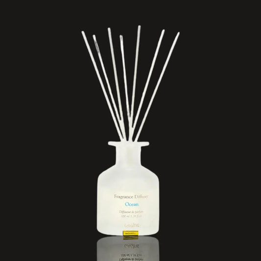Laline Ocean reed diffuser 100 ml in a frosted white glass bottle with a bundle of white reeds