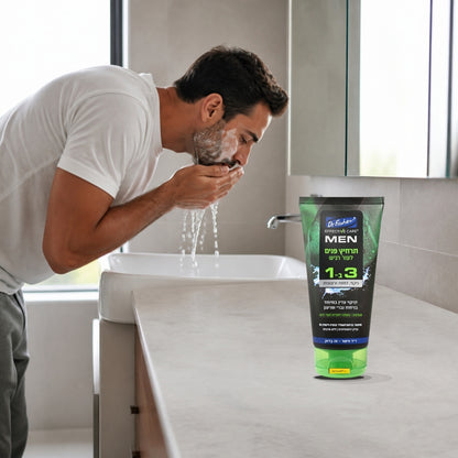 Man washing his face at a bathroom sink next to the Dr. Fischer Effective Cool MEN 3-in-1 face wash tube