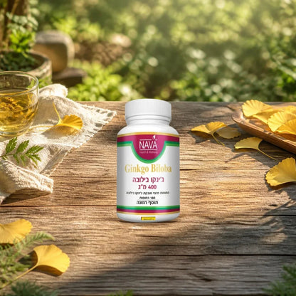 Nava ginkgo biloba 400 mg capsules jar on a sunlit wooden garden table with ginkgo leaves