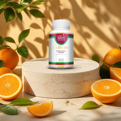 Nava vitamin C D3 zinc capsules jar on a sunlit stone podium surrounded by fresh oranges and green leaves