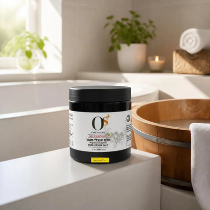 OS+ Pure English Salt 500 g tub on a bathtub edge beside a wooden foot basin and white towel