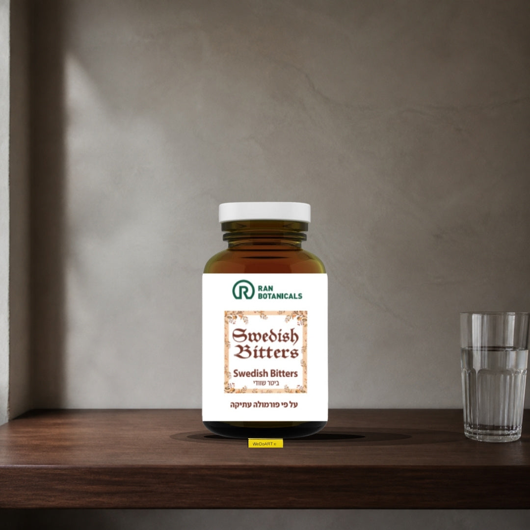 Ran Botanicals Swedish Bitters capsules jar on a dark walnut shelf next to a glass of water
