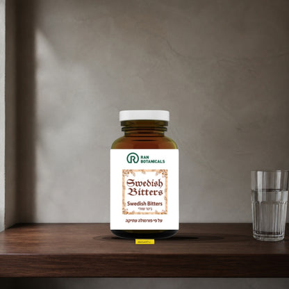 Ran Botanicals Swedish Bitters capsules jar on a dark walnut shelf next to a glass of water