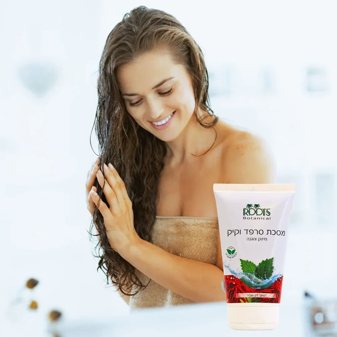 Woman with wet hair holding the Roots nettle and castor oil hair mask tube
