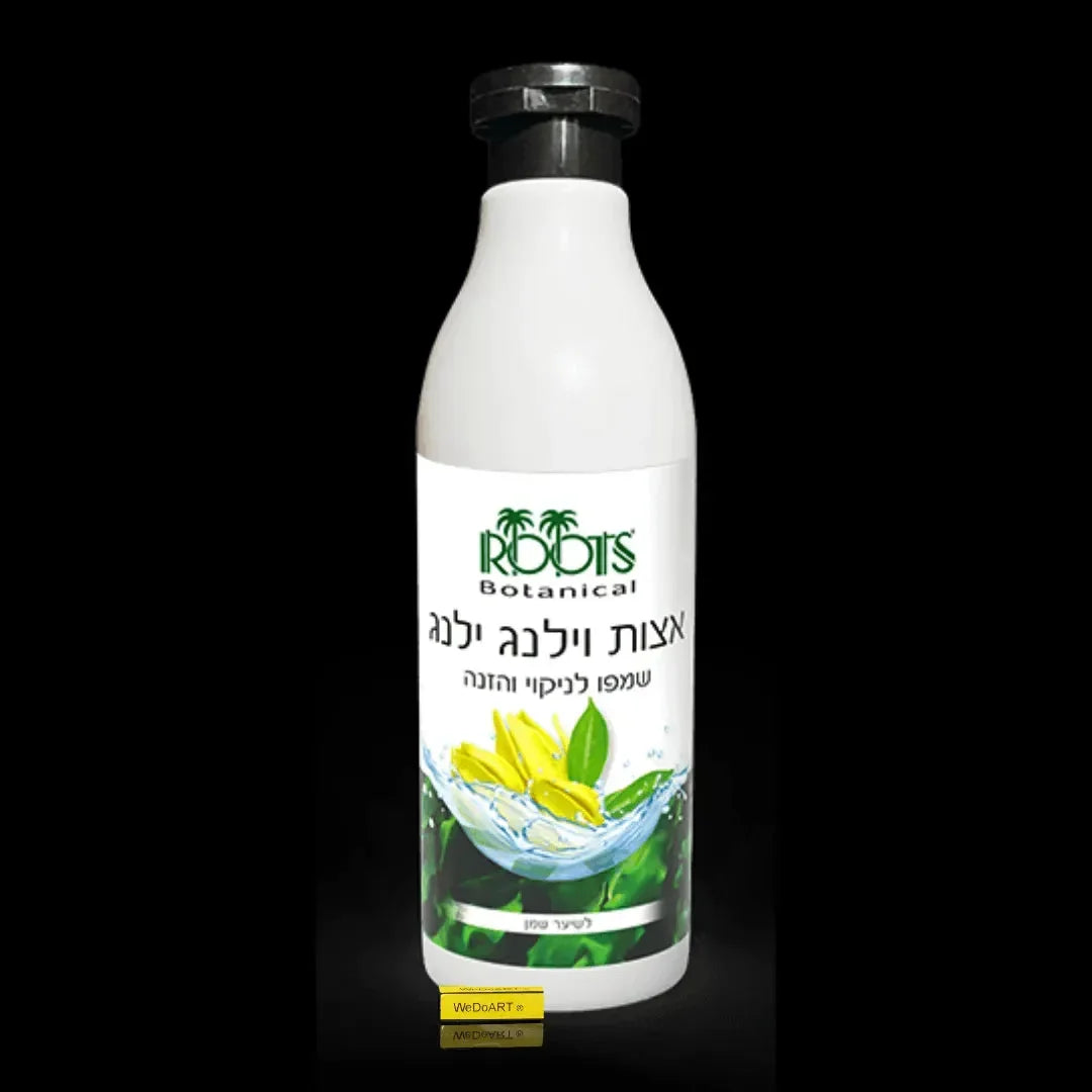 Roots ylang ylang shampoo 500 ml bottle beside fresh ylang flowers