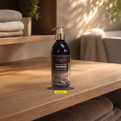 Sea of Life Dead Sea mud shampoo 500 ml pump bottle on a wooden bathroom shelf with folded towels