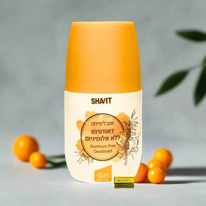 SHAVIT Buckthorn Oblifiha roll-on deodorant bottle beside orange sea buckthorn berries and leaves