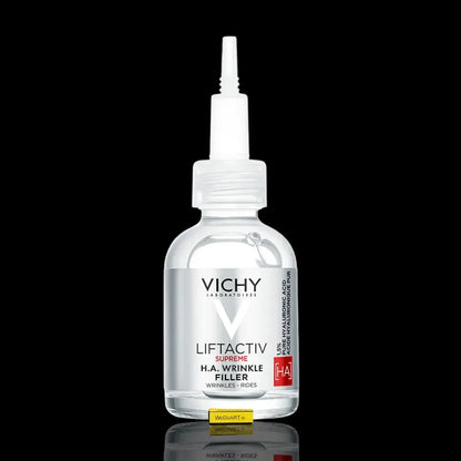 Vichy Liftactiv Supreme H.A. Wrinkle Filler 30 ml dropper bottle on a black background