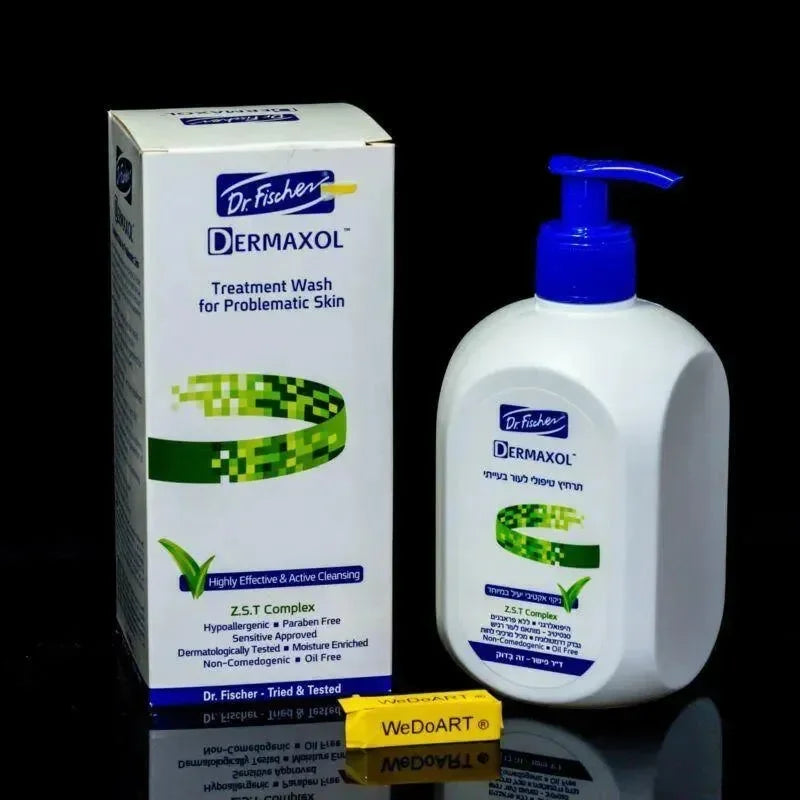 Dr. Fischer Dermaxol facial wash carton beside the pump bottle on a dark background