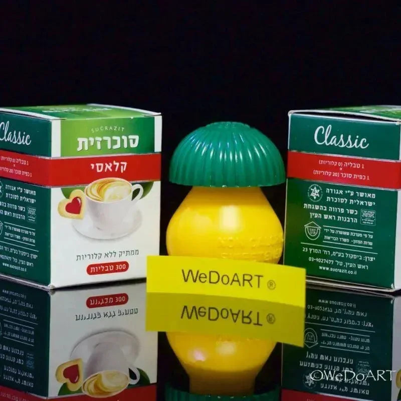 Sucrazit Classic sugar substitute cartons with the lemon-shaped tablet dispenser in front