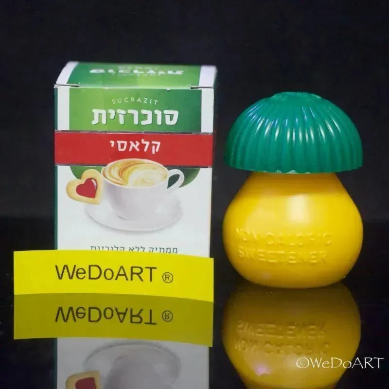 Two Sucrazit Classic cartons with the lemon-shaped dispenser between them